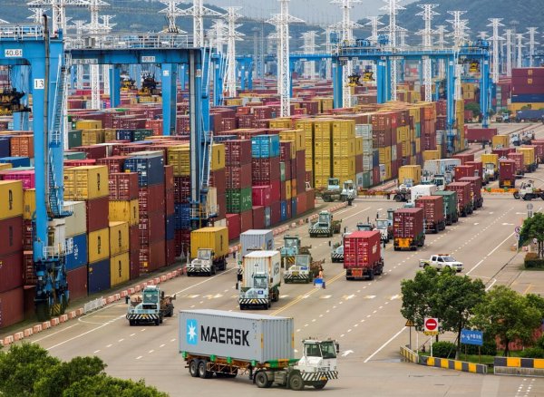Lines of trucks are seen at a container terminal of Ningbo Zhoushan port in Zhejiang province, China, August 15, 2021. Picture taken August 15, 2021. cnsphoto via REUTERS  ATTENTION EDITORS - THIS IMAGE WAS PROVIDED BY A THIRD PARTY. CHINA OUT.
