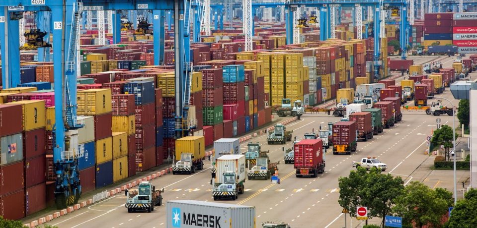 Lines of trucks are seen at a container terminal of Ningbo Zhoushan port in Zhejiang province, China, August 15, 2021. Picture taken August 15, 2021. cnsphoto via REUTERS  ATTENTION EDITORS - THIS IMAGE WAS PROVIDED BY A THIRD PARTY. CHINA OUT.